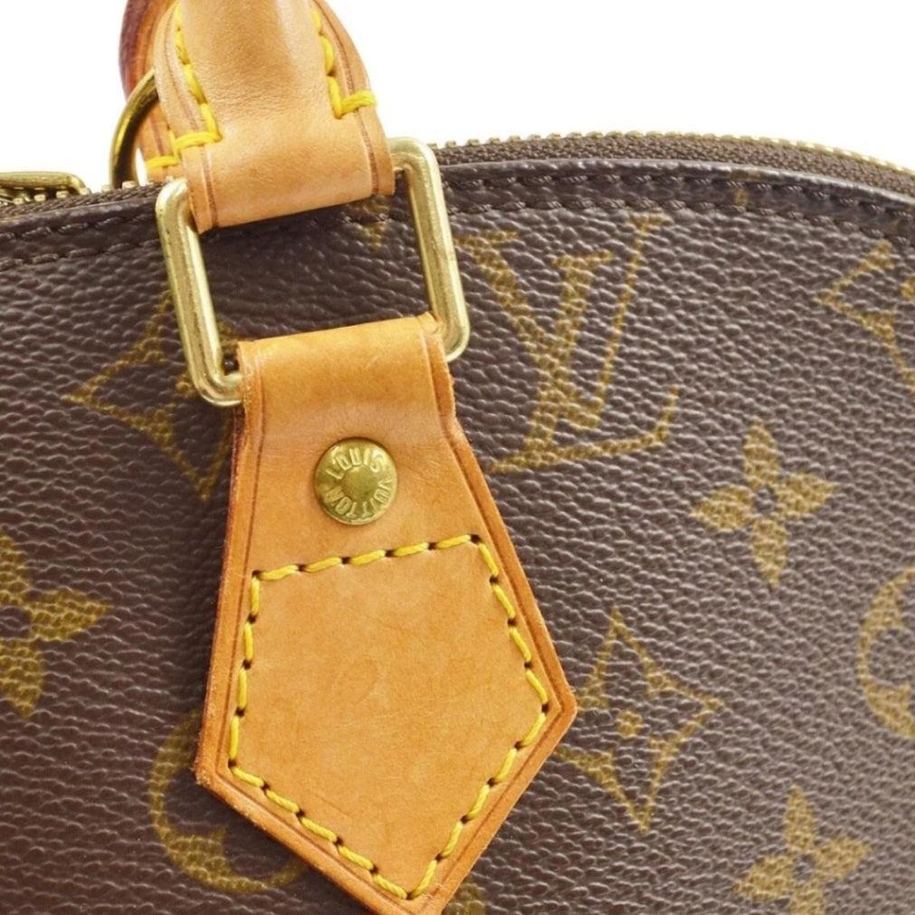 LOUIS VUITTON Monogram Alma Handbag