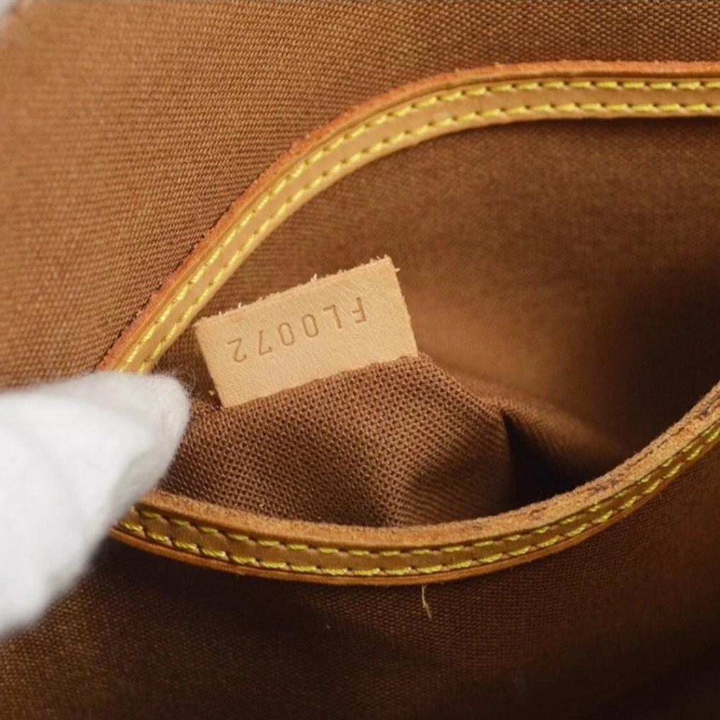 LOUIS VUITTON Monogram Alma Handbag