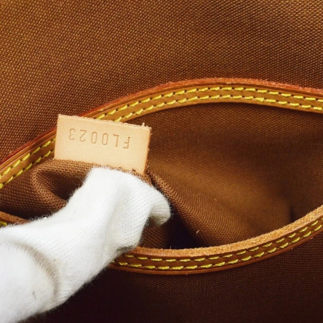 LOUIS VUITTON Monogram Alma Handbag