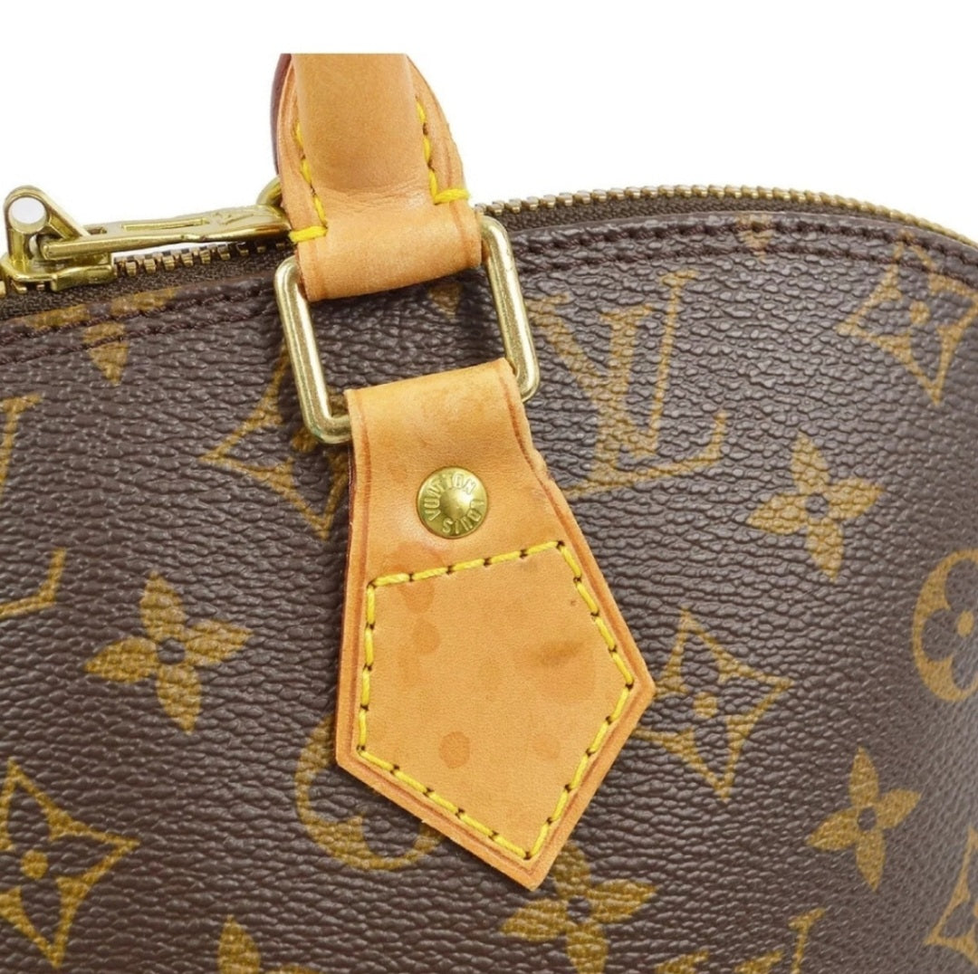 LOUIS VUITTON Monogram Alma Handbag