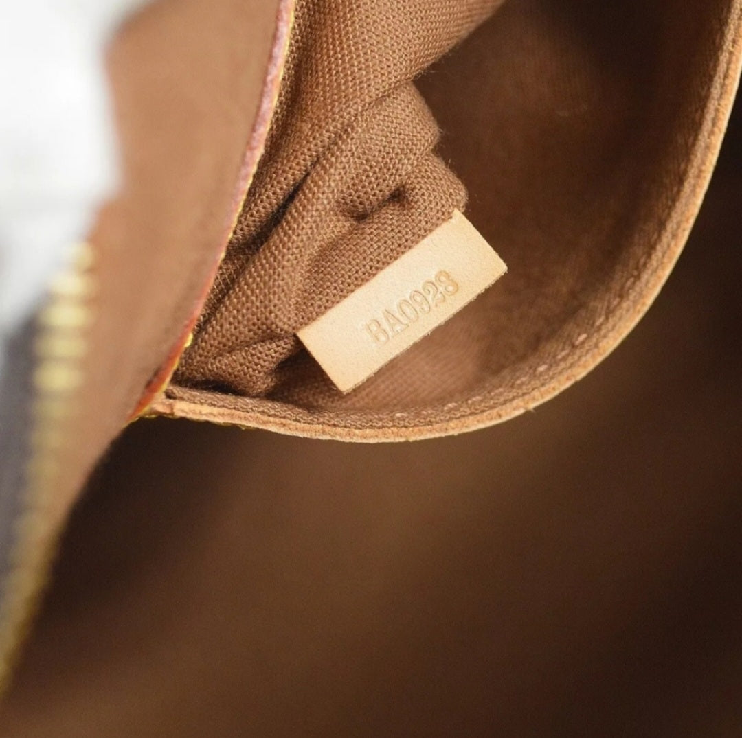 LOUIS VUITTON Monogram Alma Handbag